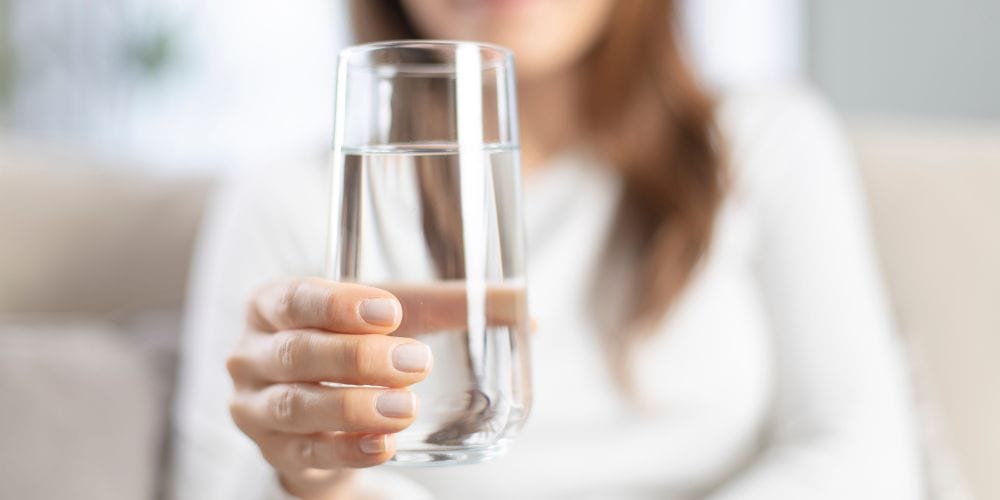 https://ocwellnessphysicians.com/wp-content/uploads/2015/04/Drinking-Water-1.jpg